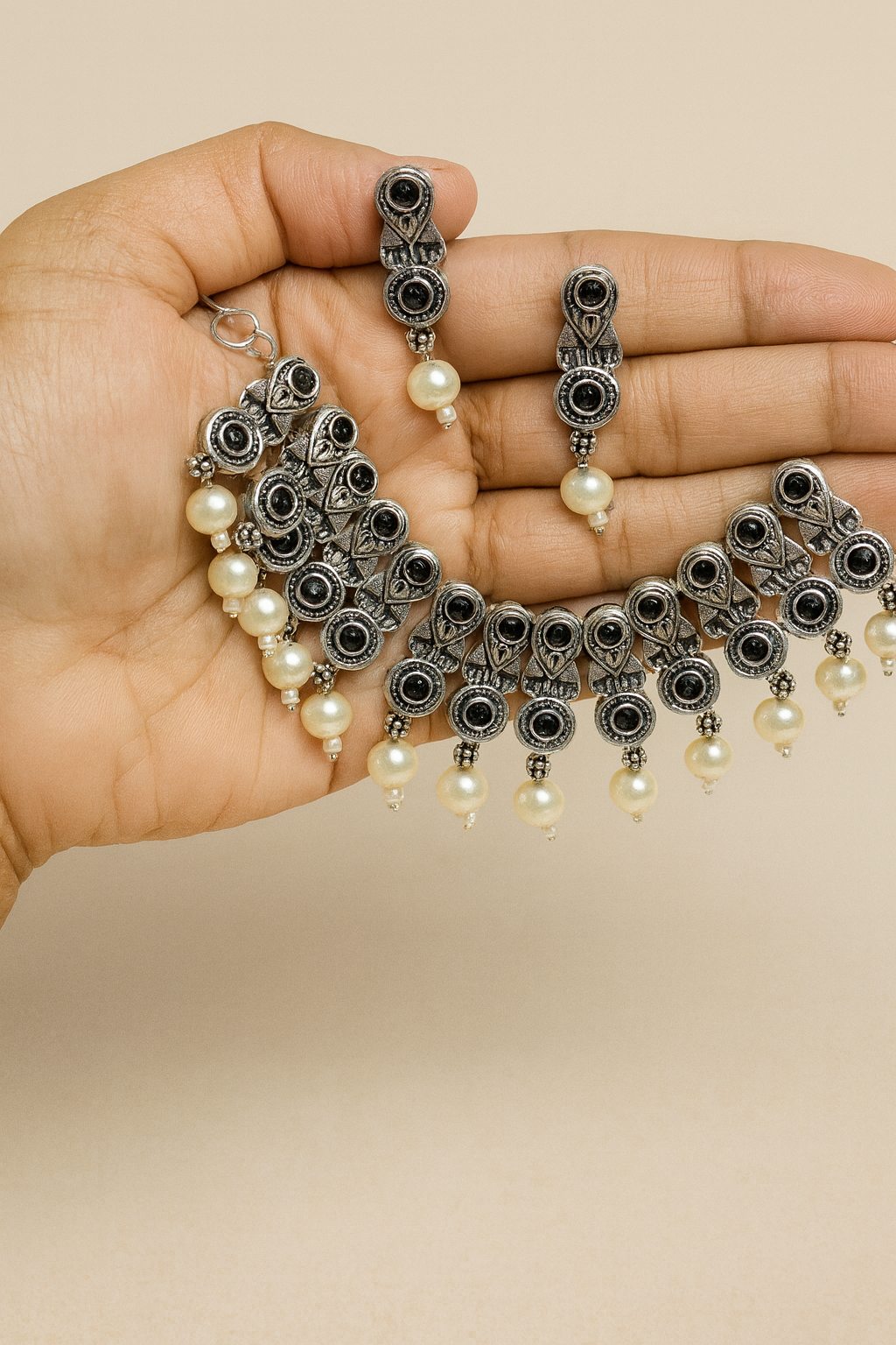 Silver, black stones and pearl necklace with earrings