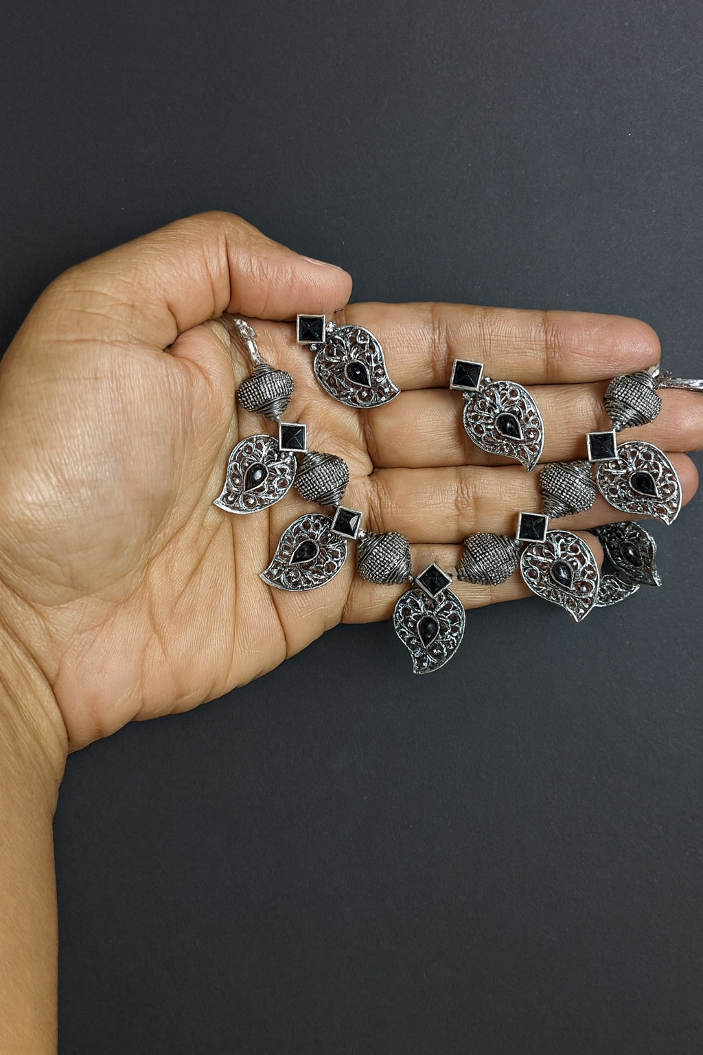 Silver and black stones necklace with earrings