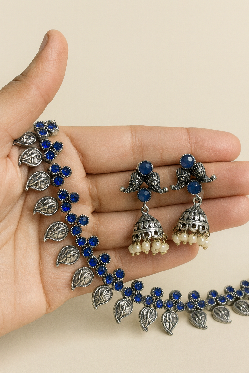 Silver and blue stones necklace with earrings