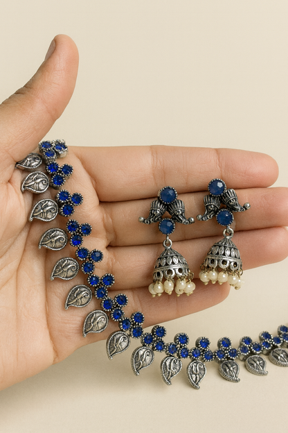 Silver and blue stones necklace with earrings