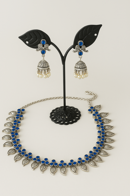 Silver and blue stones necklace with earrings