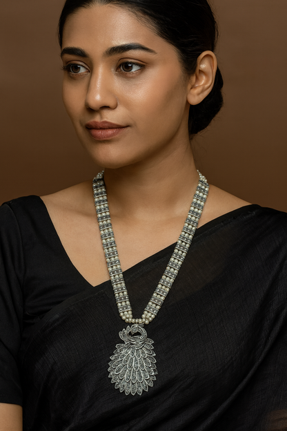 Silver and pearl peacock long necklace