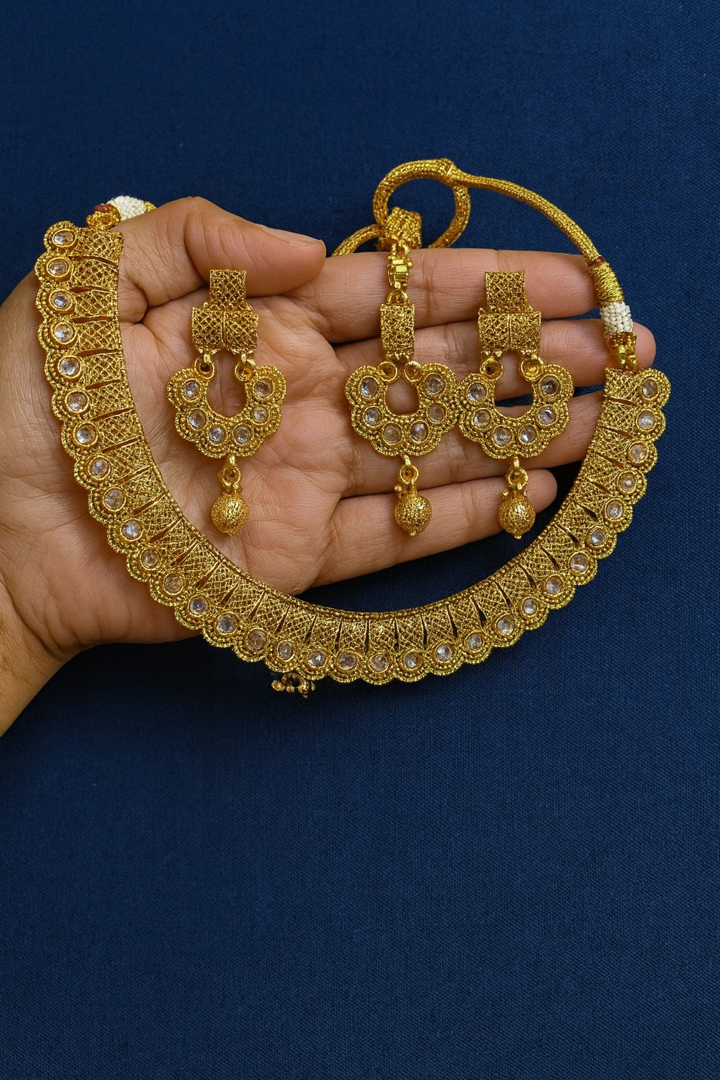 Gold necklace with earrings and matha tikka - 2105