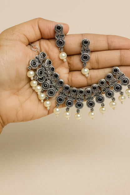 Silver, black stones and pearl necklace with earrings