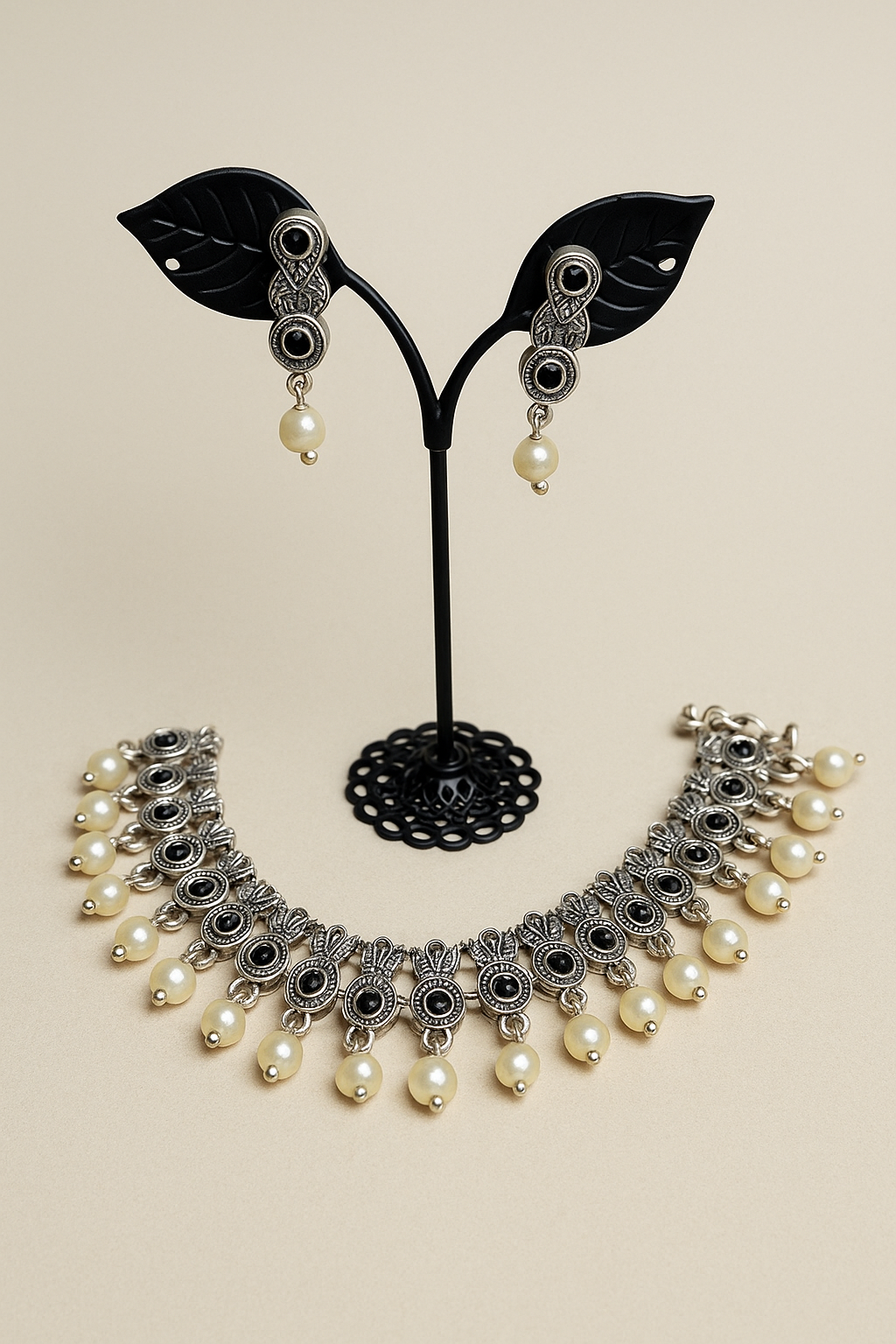 Silver, black stones and pearl necklace with earrings
