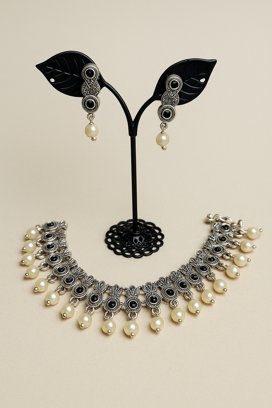 Silver, black stones and pearl necklace with earrings