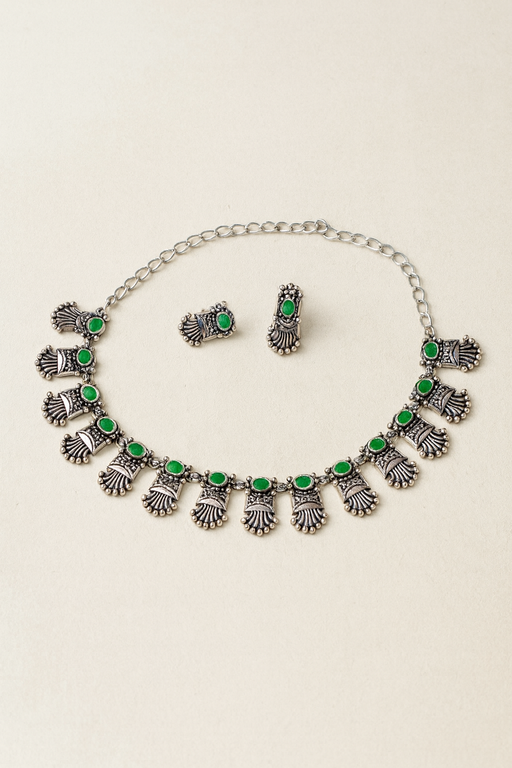 Silver and green stones necklace with earrings