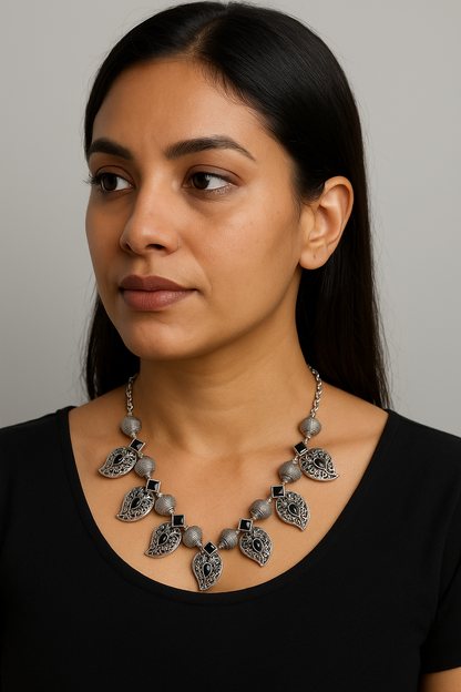 Silver and black stones necklace with earrings
